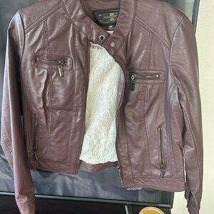 Medium brown leather jacket with faux fur lining. Size medium. Barely used.
